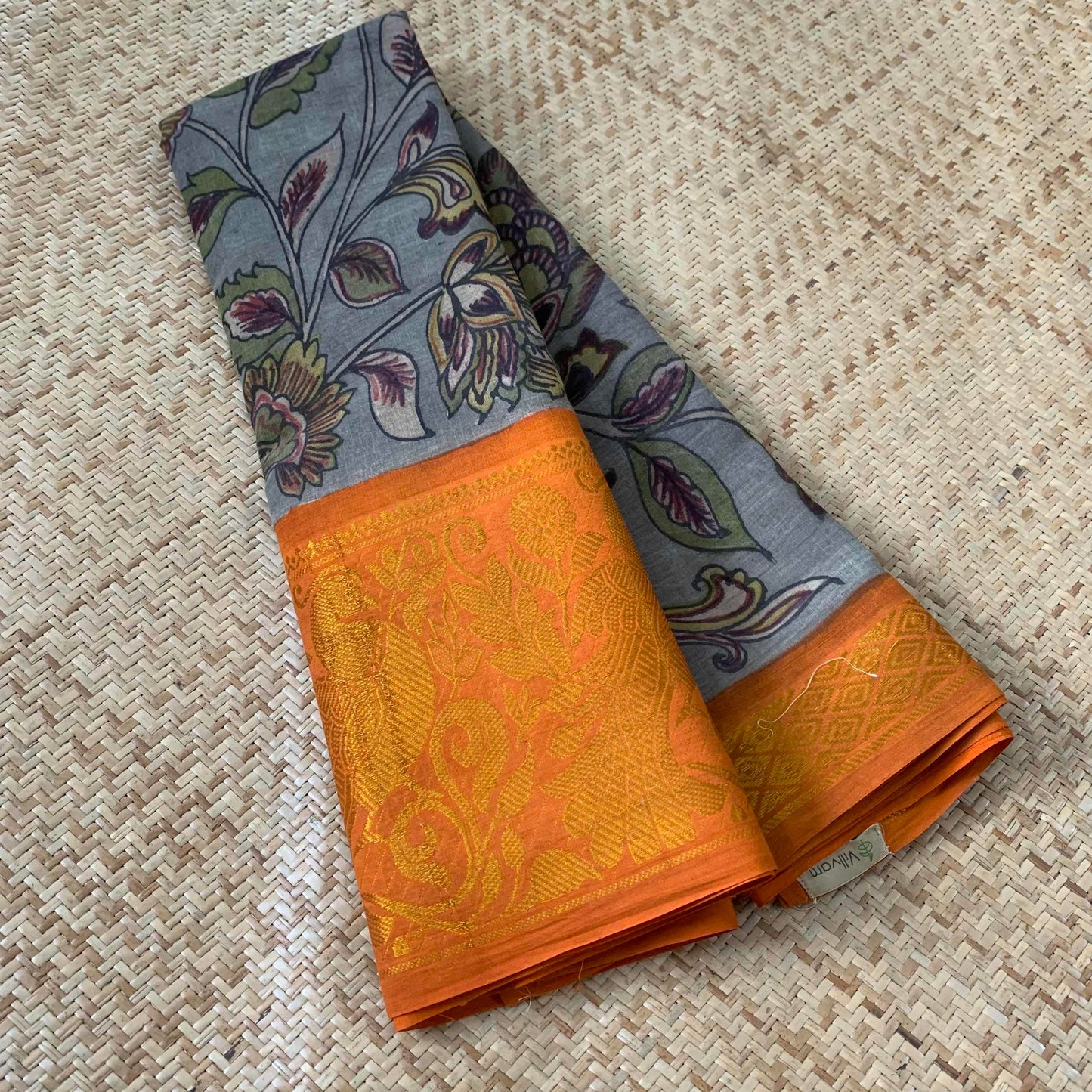 Grey Kalamkari Hand Painted on a Madurai Sungudi Cotton saree.