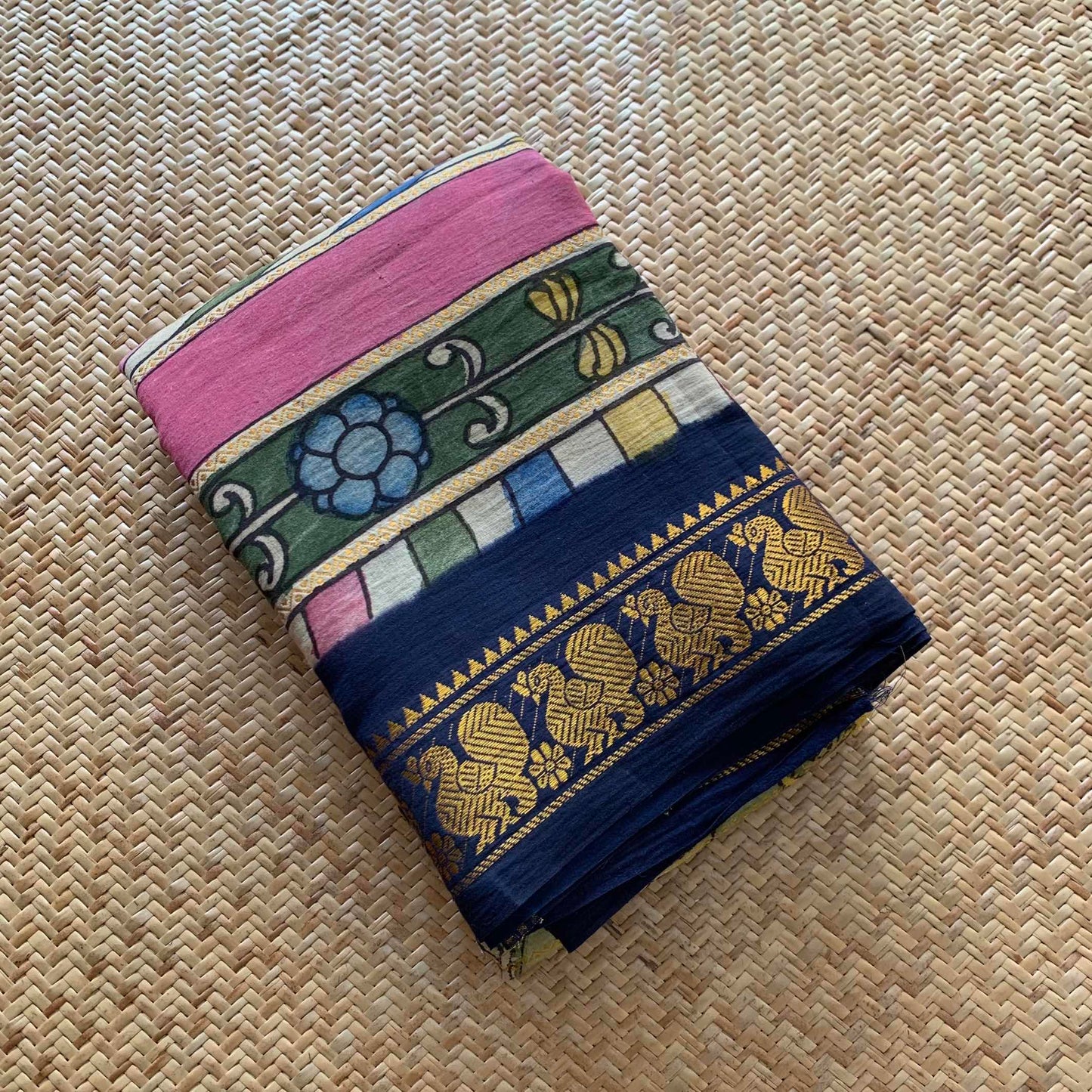 Multicoloured Kalamkari Hand Painted on a Madurai Velthari Sungudi Cotton saree.