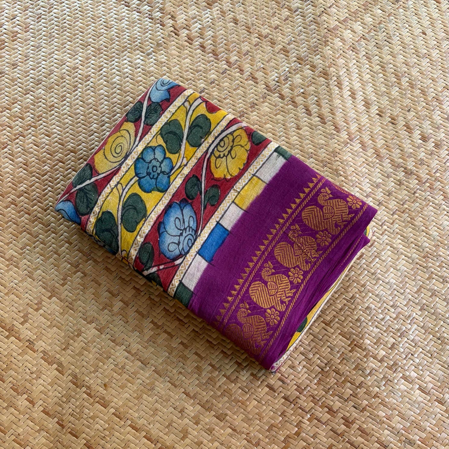 Multicoloured Kalamkari Hand Painted on a Madurai Velthari Sungudi Cotton saree.