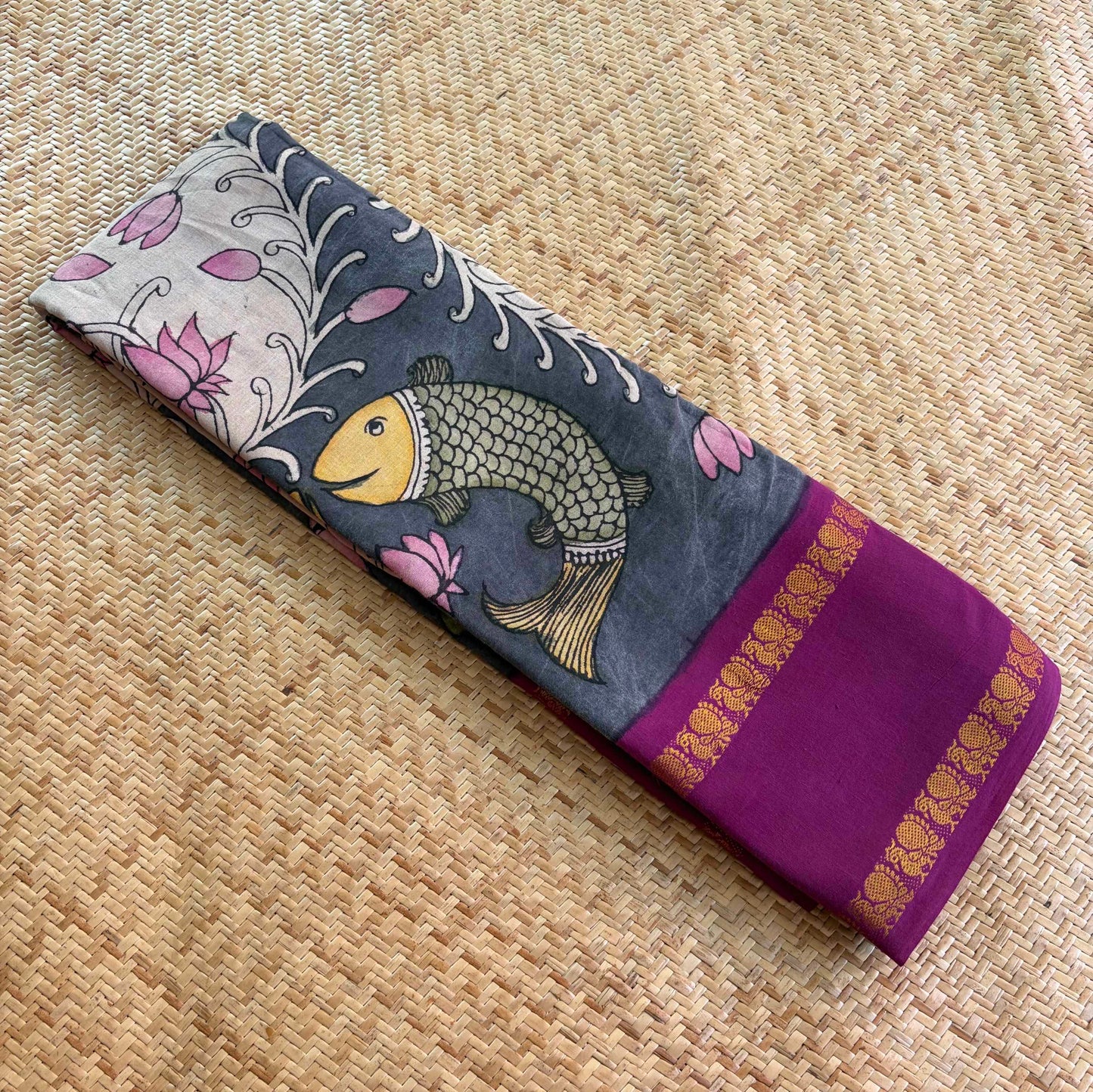 Fish, Kalamkari Hand Painted on a Madurai Sungudi Cotton saree.