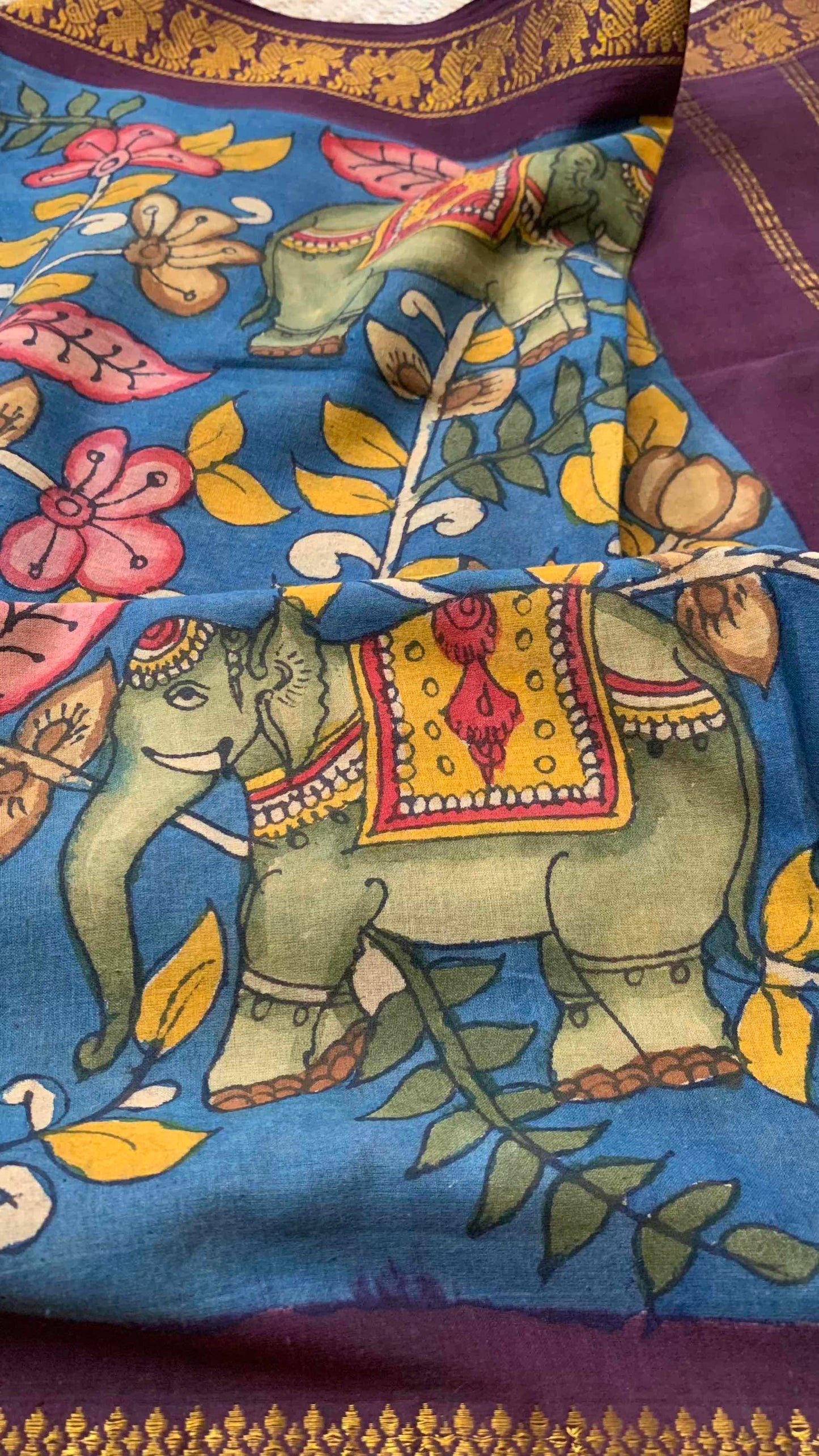 Blue Kalamkari Hand Painted on a Madurai Sungudi Cotton saree.