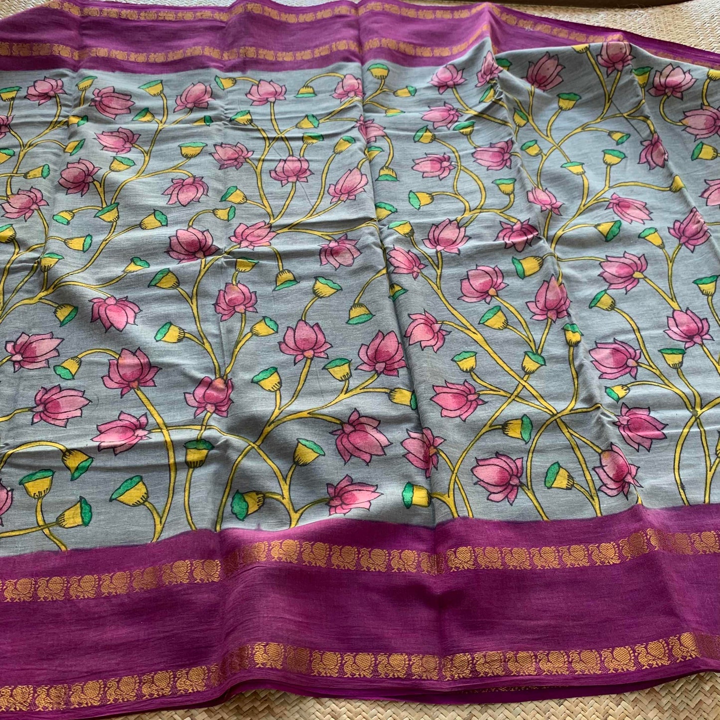 Grey Kalamkari Hand Painted on a Madurai Sungudi Cotton saree.