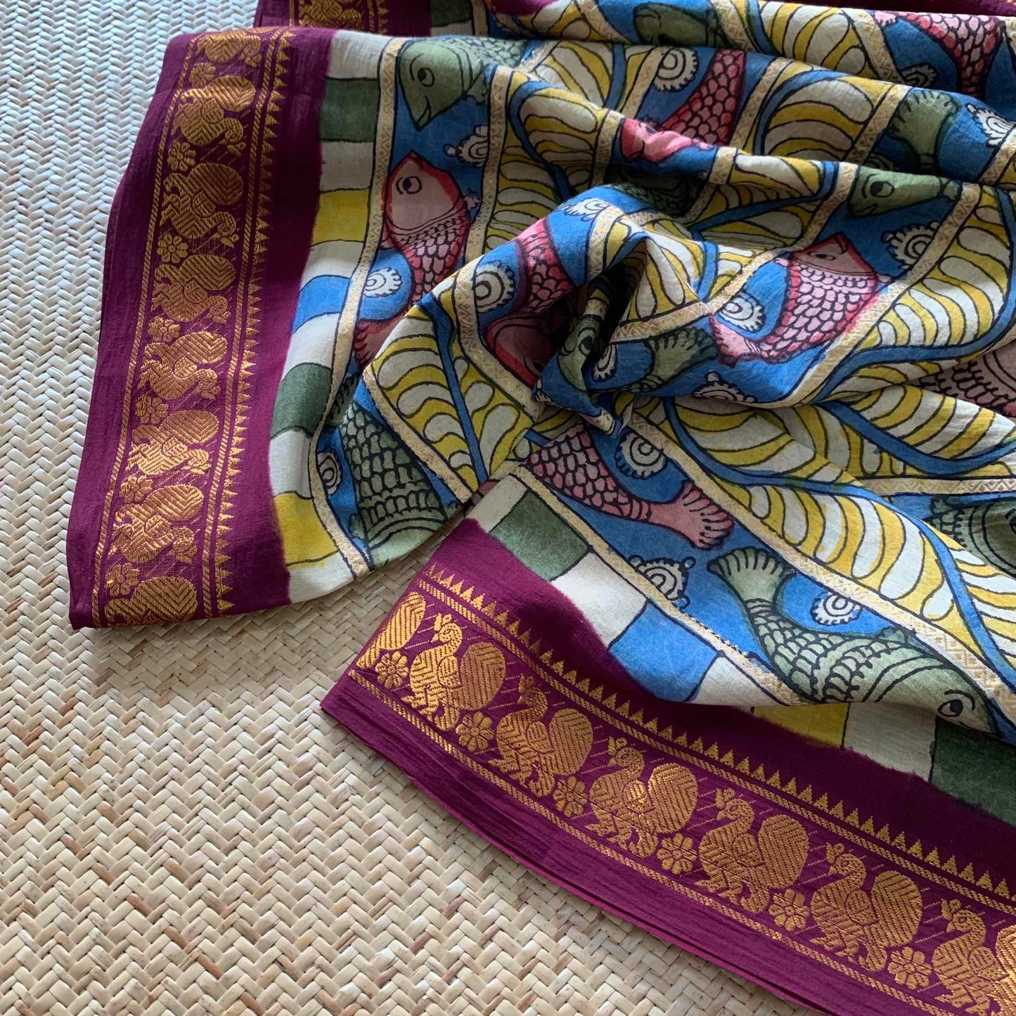 Multicoloured Kalamkari Hand Painted on a Madurai Velthari Sungudi Cotton saree.