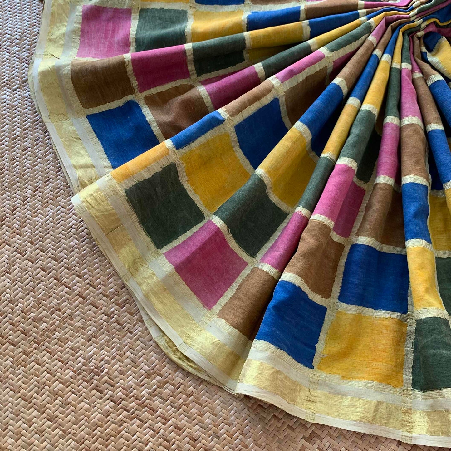 Multicoloured Kalamkari Hand Painted on a Madurai Velthari Sungudi Cotton saree.