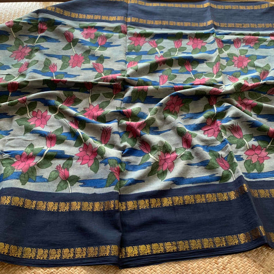 Lotus Kalamkari Hand Painted on a Madurai Sungudi Cotton saree.
