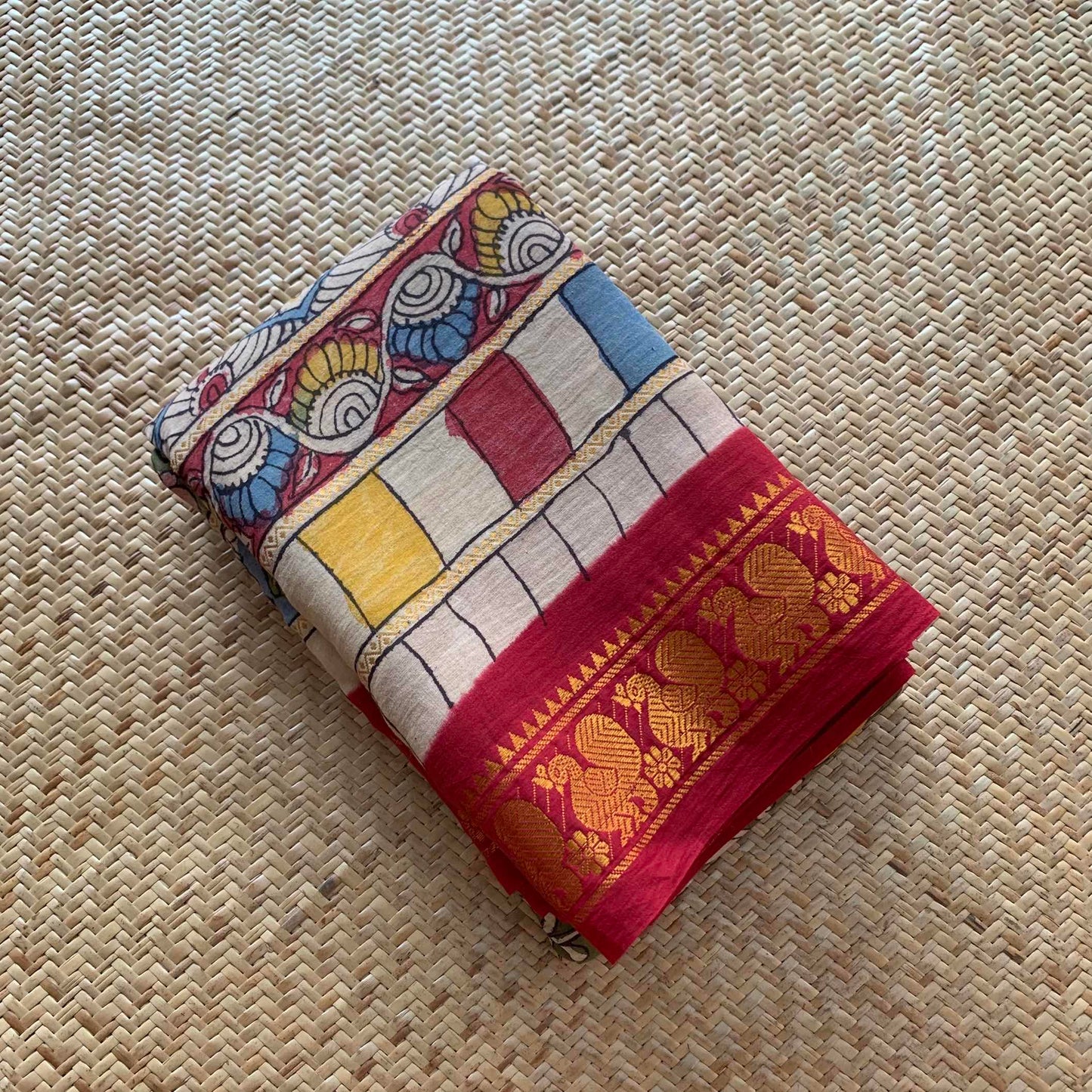 Multicoloured Kalamkari Hand Painted on a Madurai Velthari Sungudi Cotton saree.