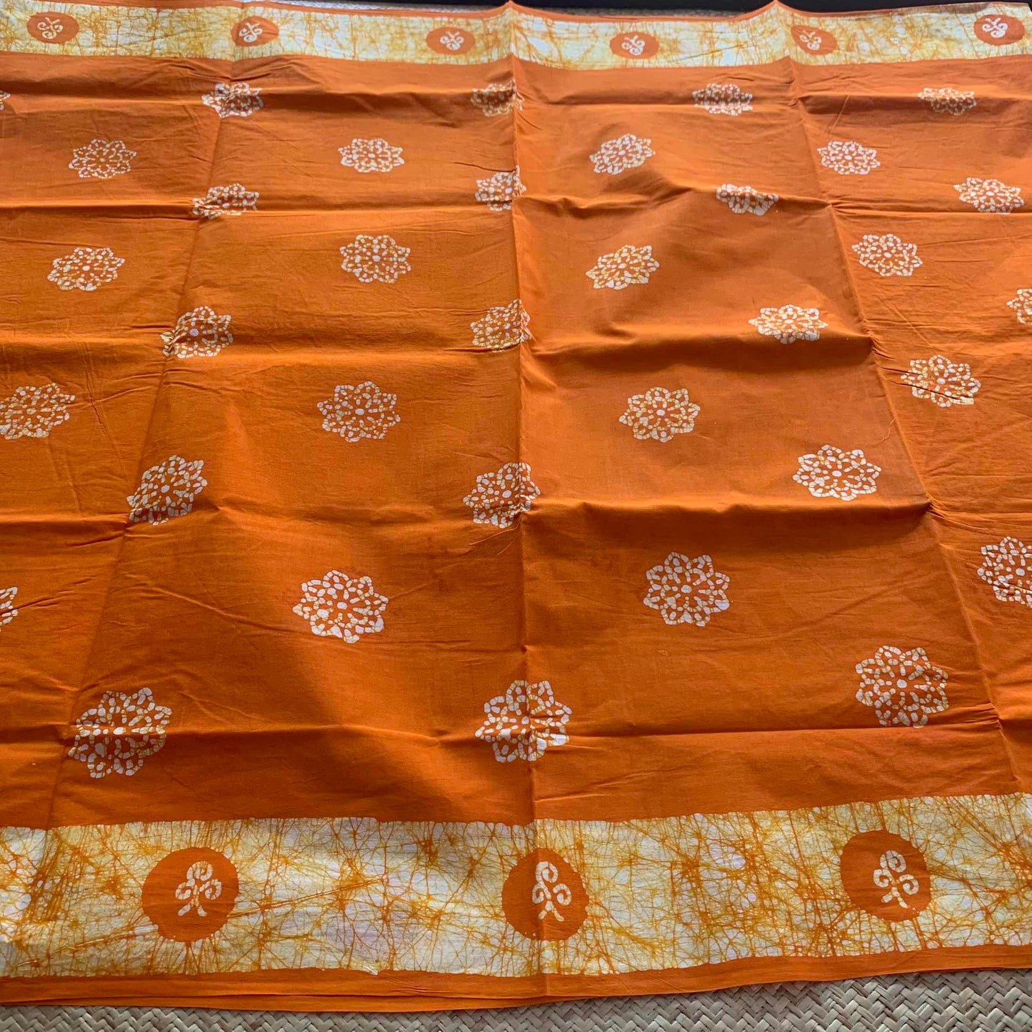 Orange Wax Print Sungudi Saree