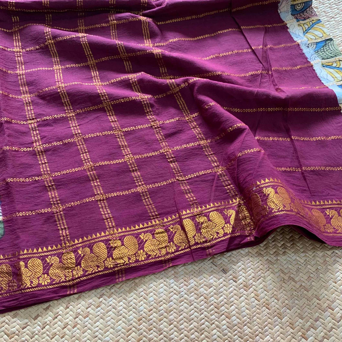 Multicoloured Kalamkari Hand Painted on a Madurai Velthari Sungudi Cotton saree.