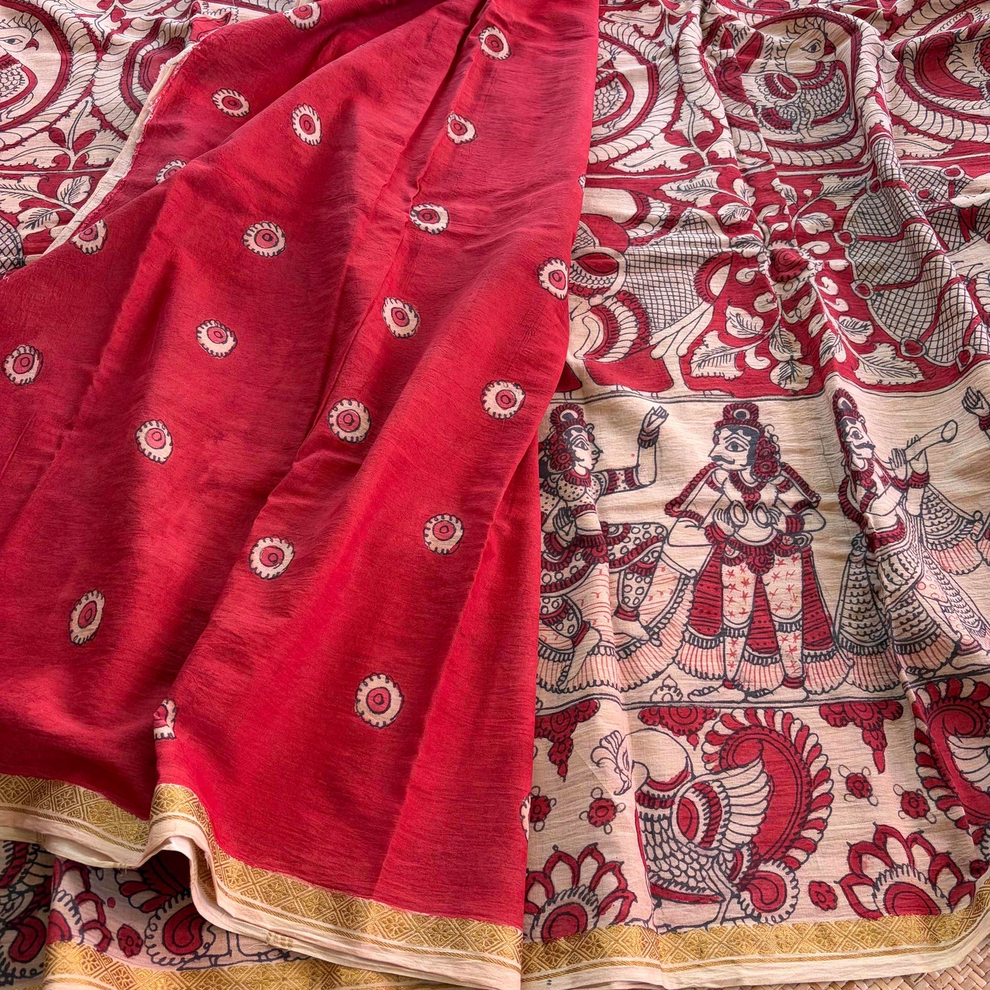 Red Floral Kalamkari Hand Painted on a Madurai Velthari Sungudi Cotton saree.
