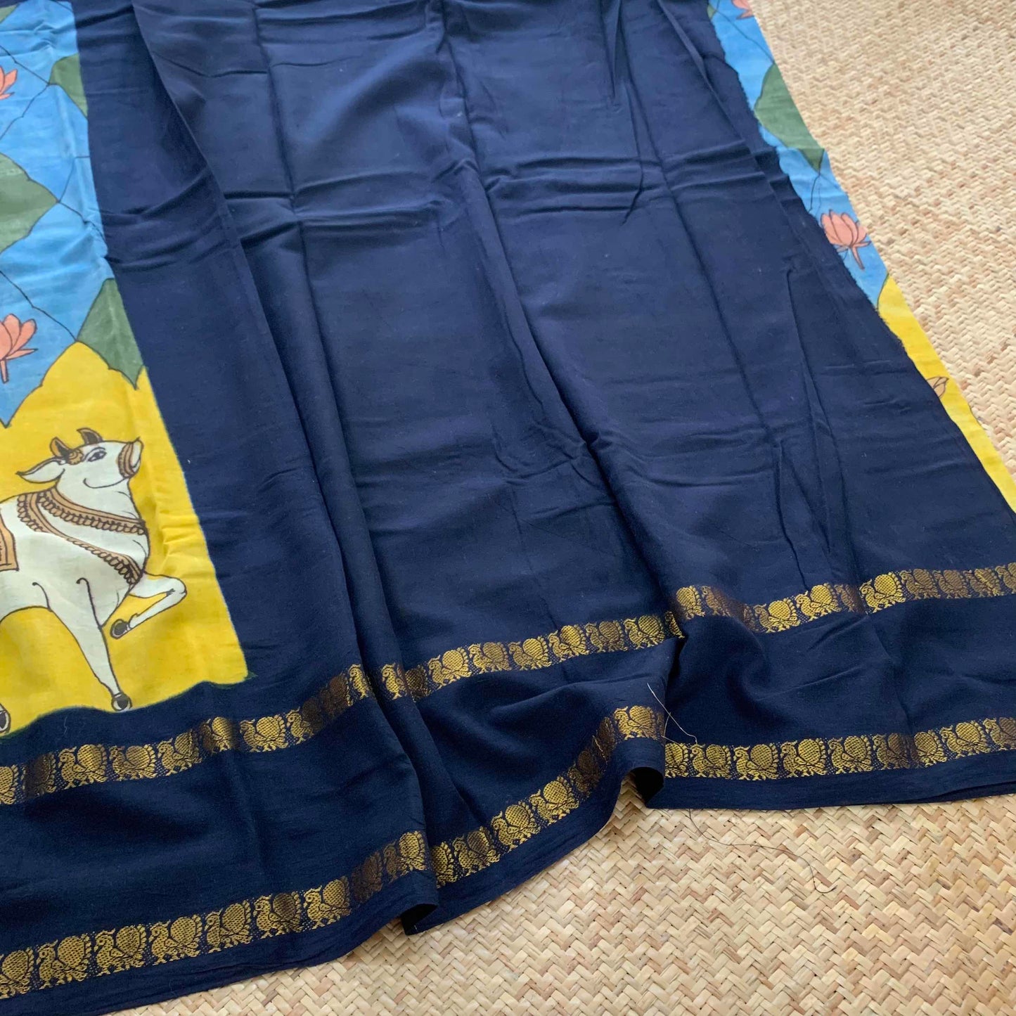 Nandhi Kalamkari Hand Painted on a Madurai Sungudi Cotton saree.