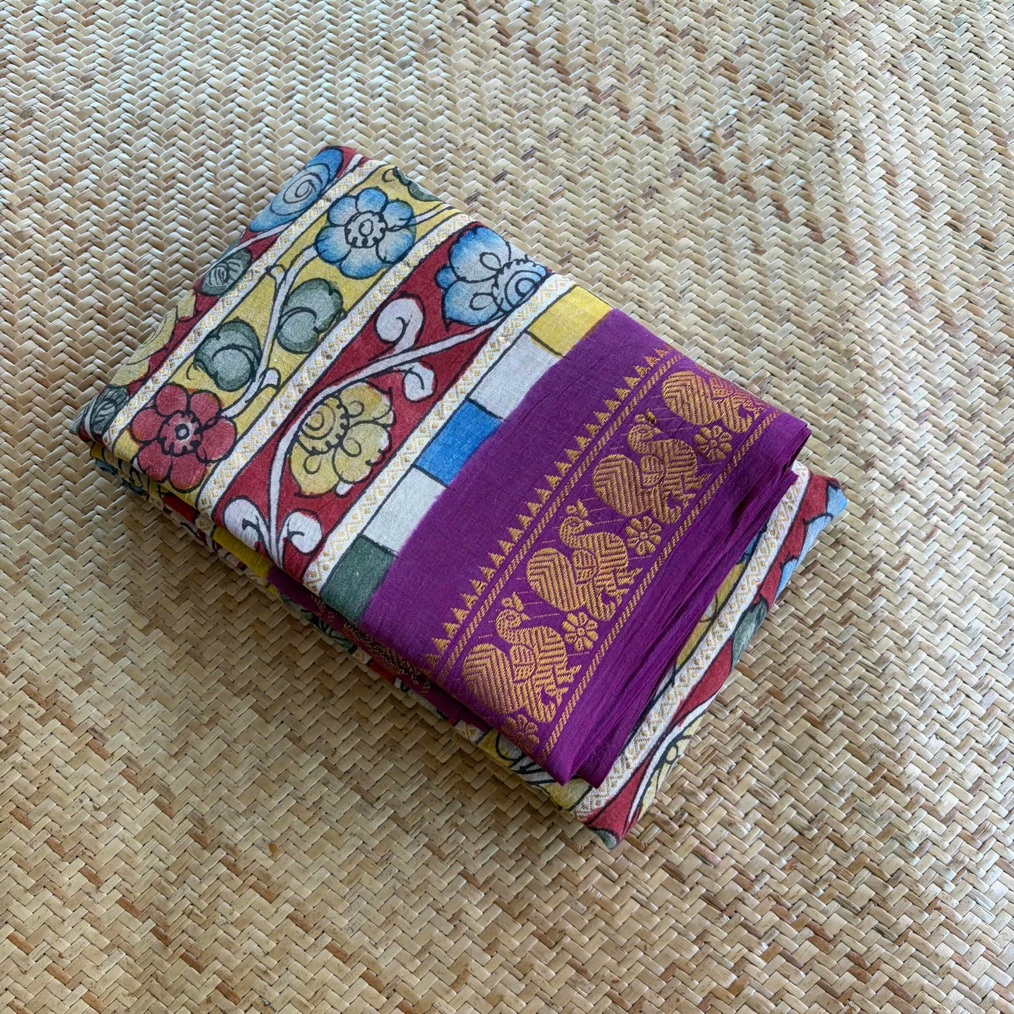 Multicoloured Kalamkari Hand Painted on a Madurai Velthari Sungudi Cotton saree.