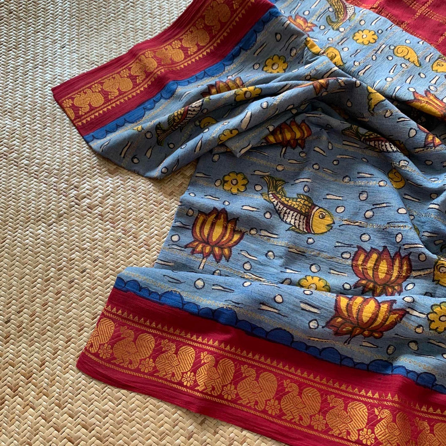 Pound- Kalamkari Hand Painted on a Madurai Velthari Sungudi Cotton saree.