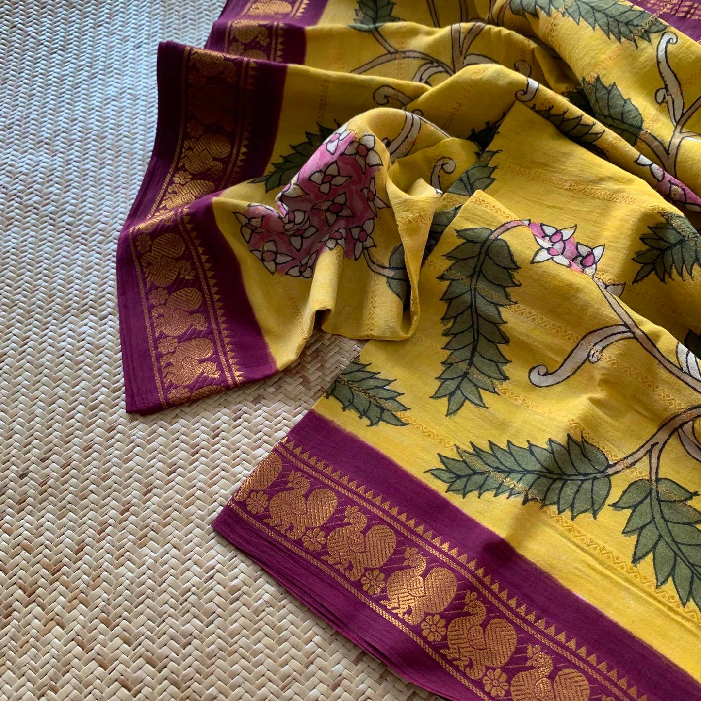 Mustard Kalamkari Hand Painted on a Madurai Velthari Sungudi Cotton saree.