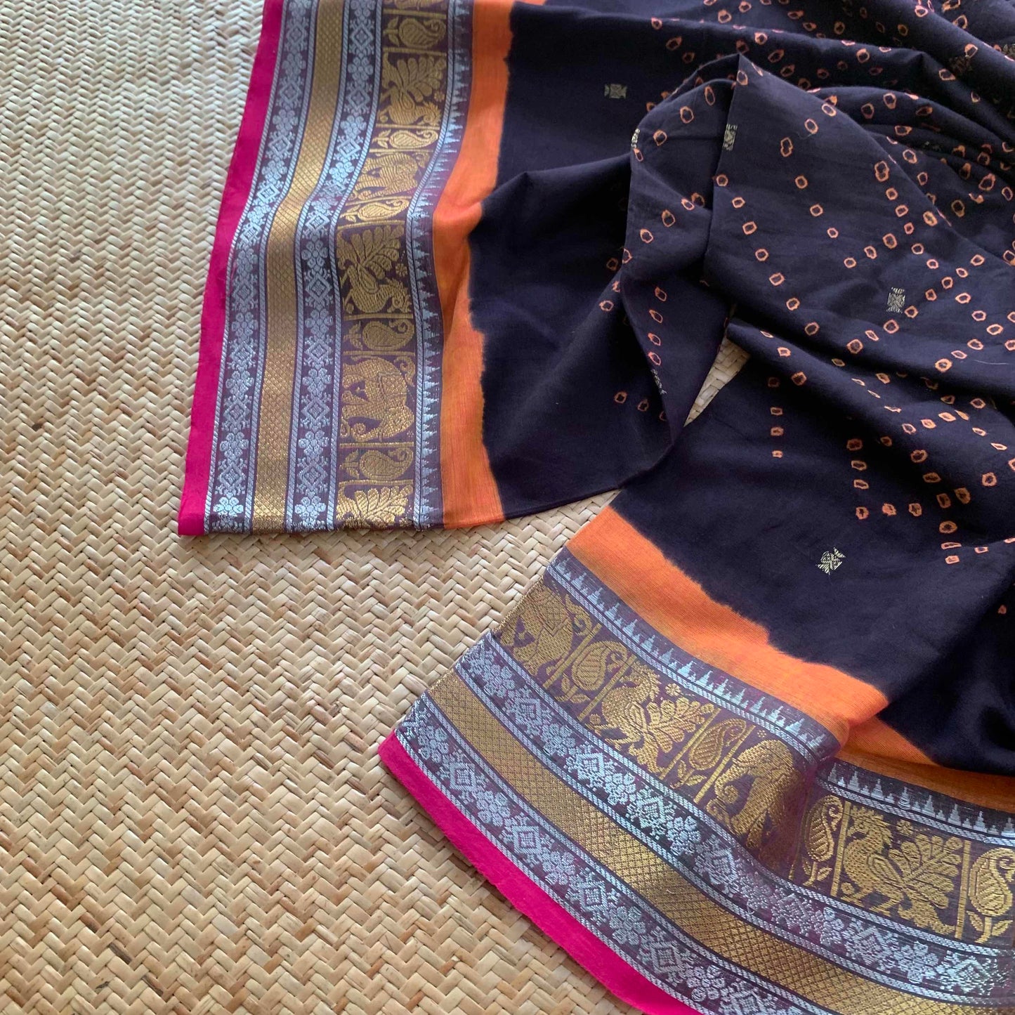 Handknotted Sungudi on Chettinad Cotton Saree, Black saree with Orange Knots And Pallu With Zari Border
