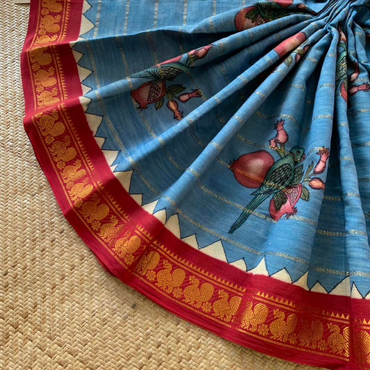 Parrot- Pomegranate Kalamkari Hand Painted on a Madurai Velthari Sungudi Cotton saree.