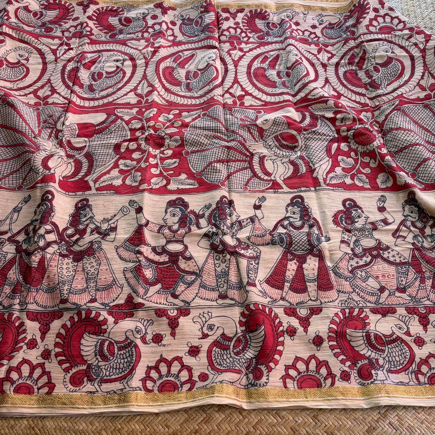 Red Floral Kalamkari Hand Painted on a Madurai Velthari Sungudi Cotton saree.