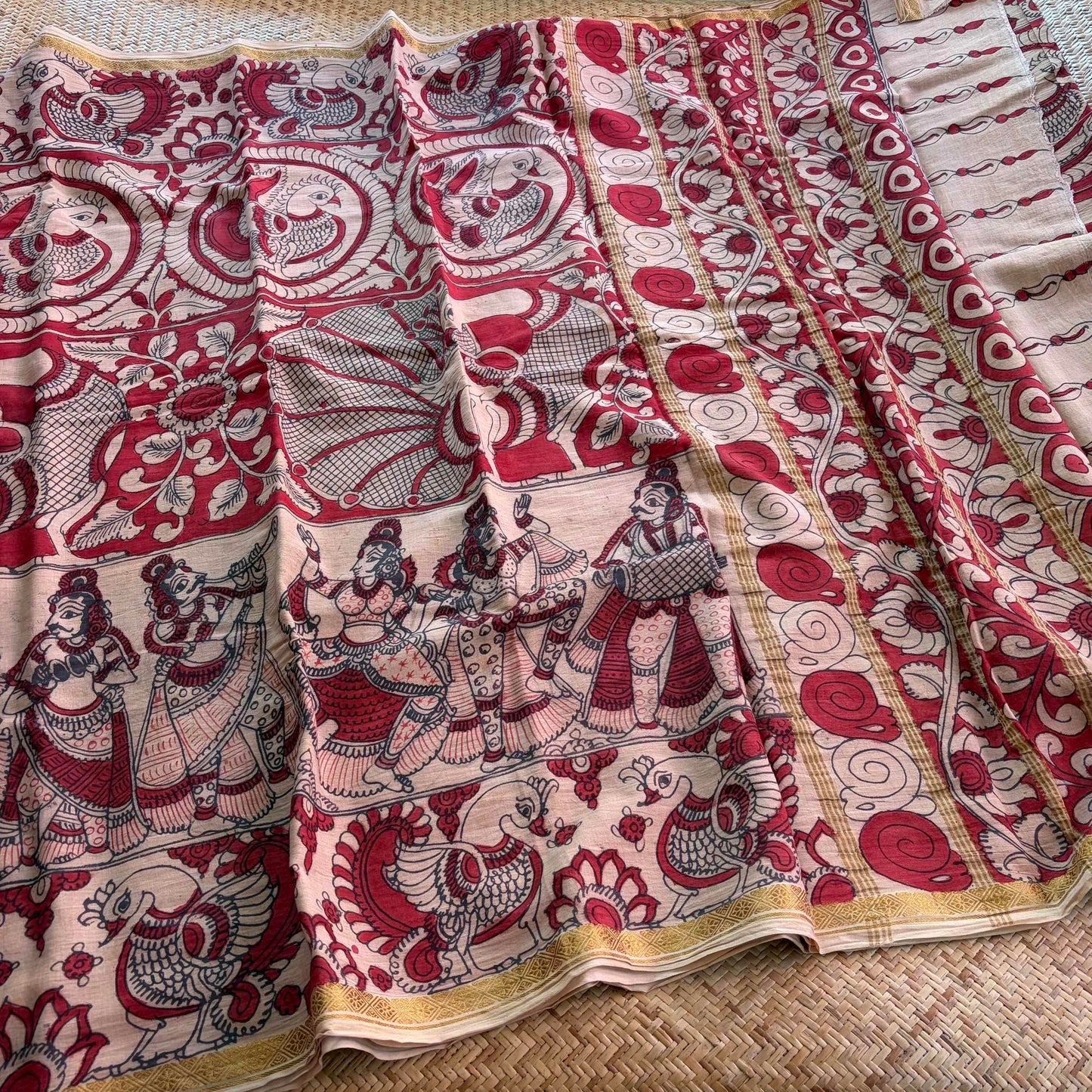 Red Floral Kalamkari Hand Painted on a Madurai Velthari Sungudi Cotton saree.