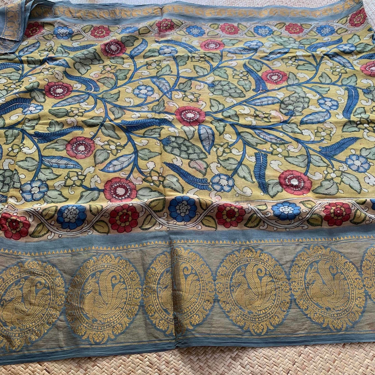 Grey Kalamkari Hand Painted on a Madurai Sungudi Cotton saree.