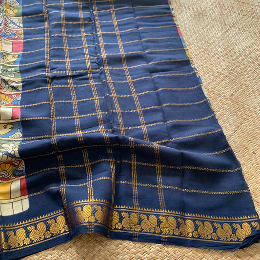 Cream Kalamkari Hand Painted on a Madurai Velthari Sungudi Cotton saree.