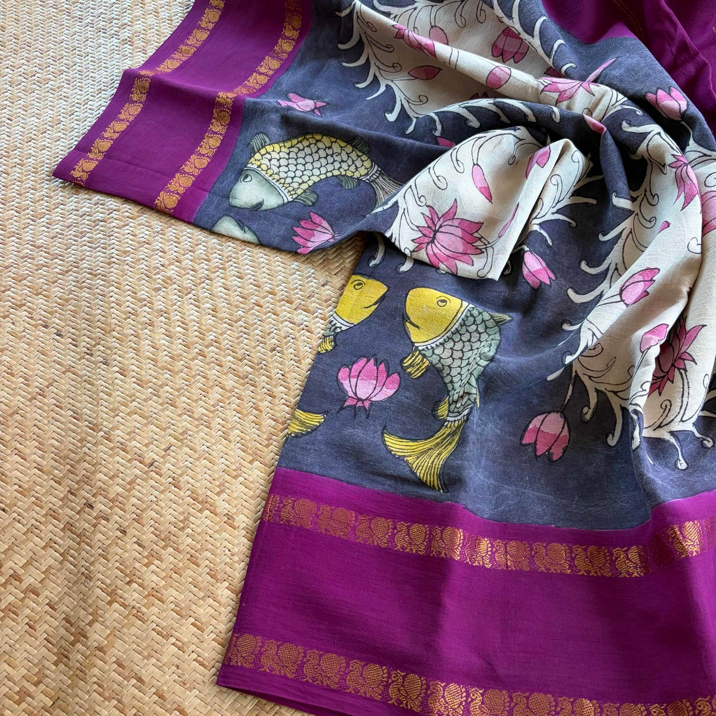 Fish, Kalamkari Hand Painted on a Madurai Sungudi Cotton saree.