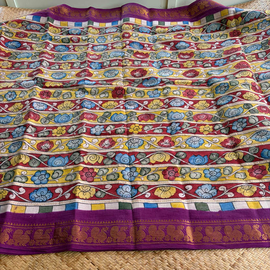 Multicoloured Kalamkari Hand Painted on a Madurai Velthari Sungudi Cotton saree.