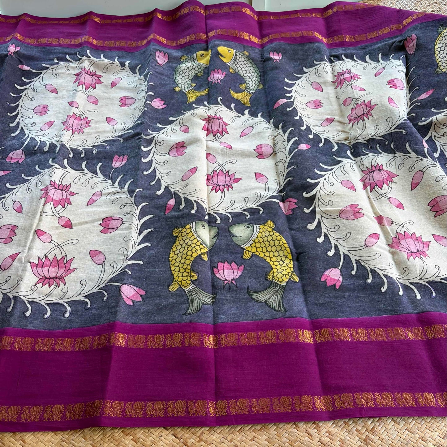 Fish, Kalamkari Hand Painted on a Madurai Sungudi Cotton saree.