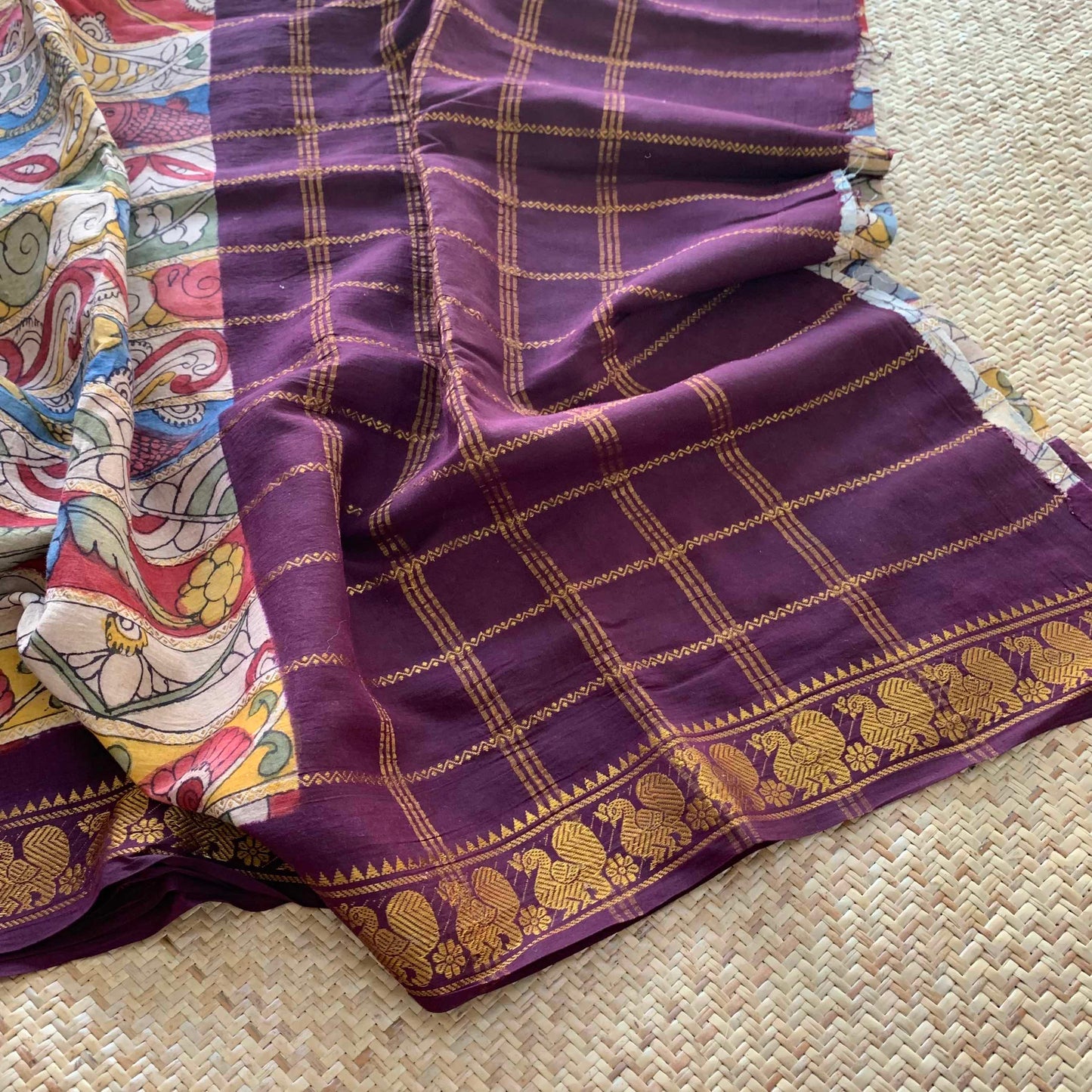 Multicoloured Kalamkari Hand Painted on a Madurai Velthari Sungudi Cotton saree.