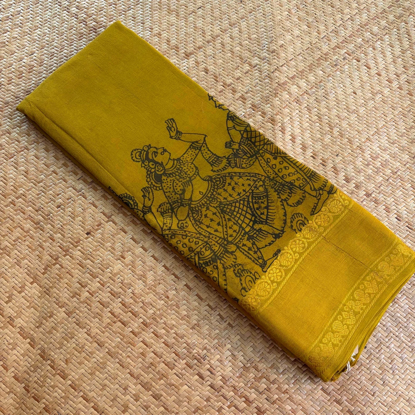 Mustard, Kalamkari Hand Painted on a Madurai Sungudi Cotton saree.