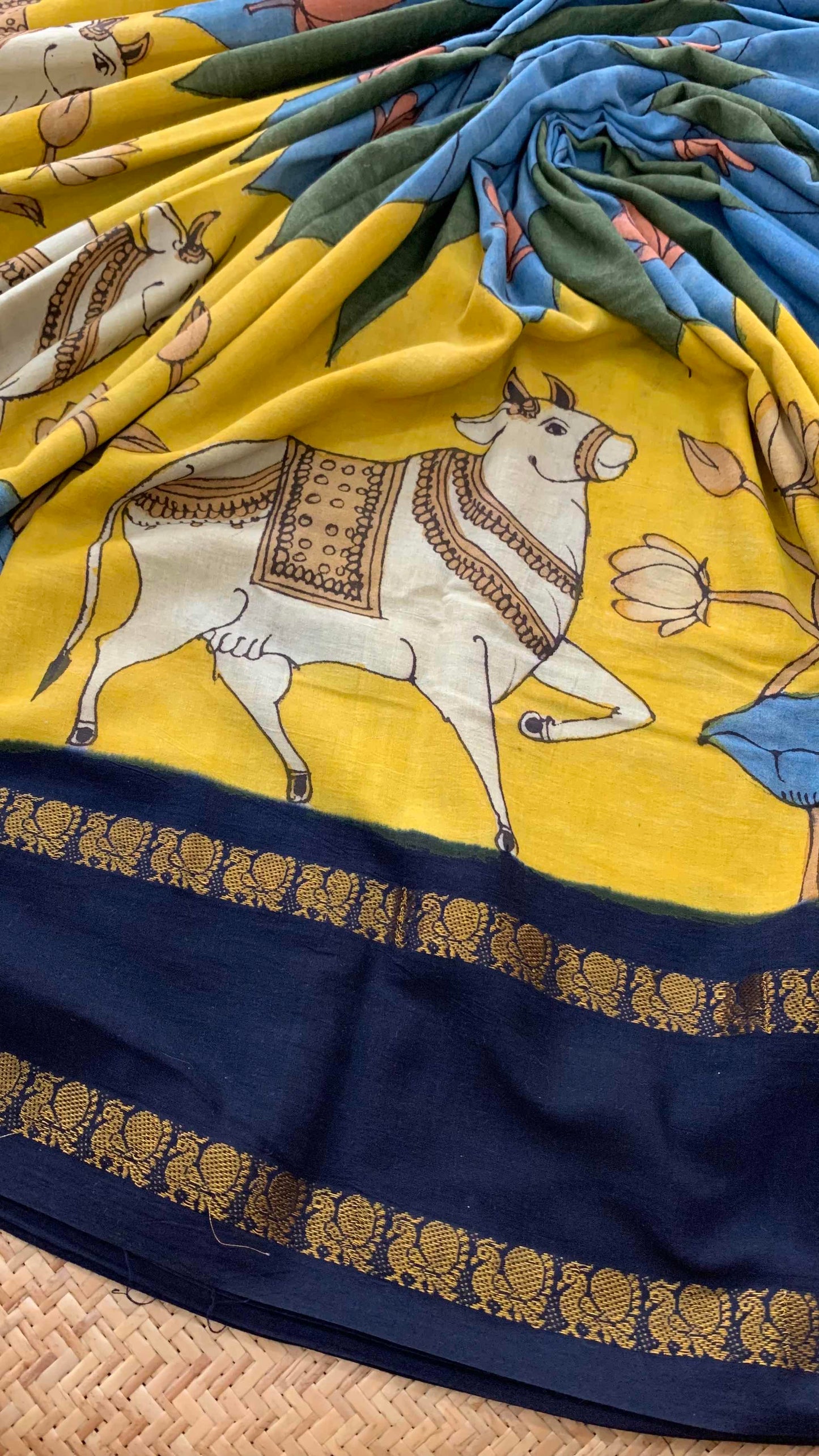 Nandhi Kalamkari Hand Painted on a Madurai Sungudi Cotton saree.