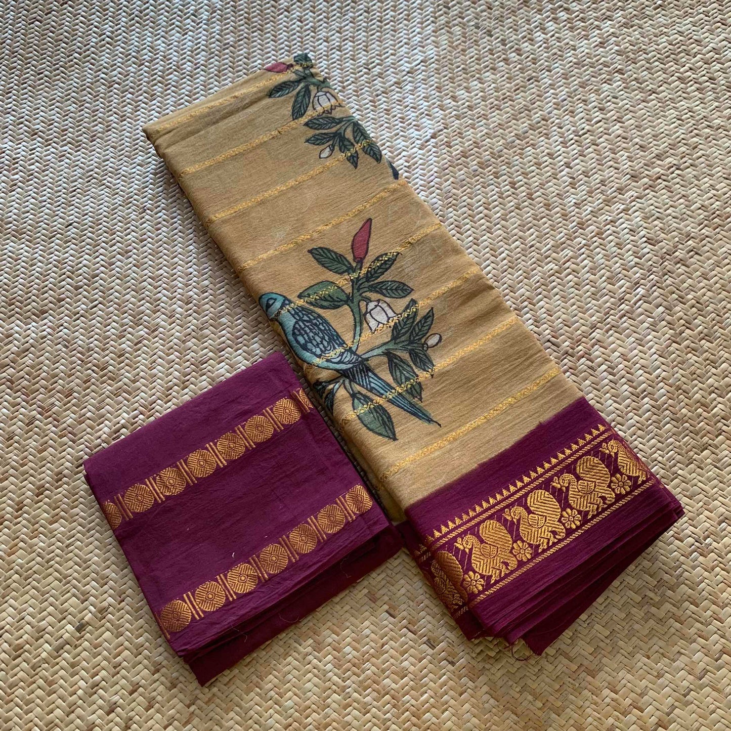 Parrot- chilli Kalamkari Hand Painted on a Madurai Velthari Sungudi Cotton saree.