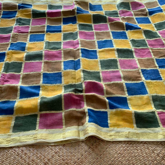 Multicoloured Kalamkari Hand Painted on a Madurai Velthari Sungudi Cotton saree.