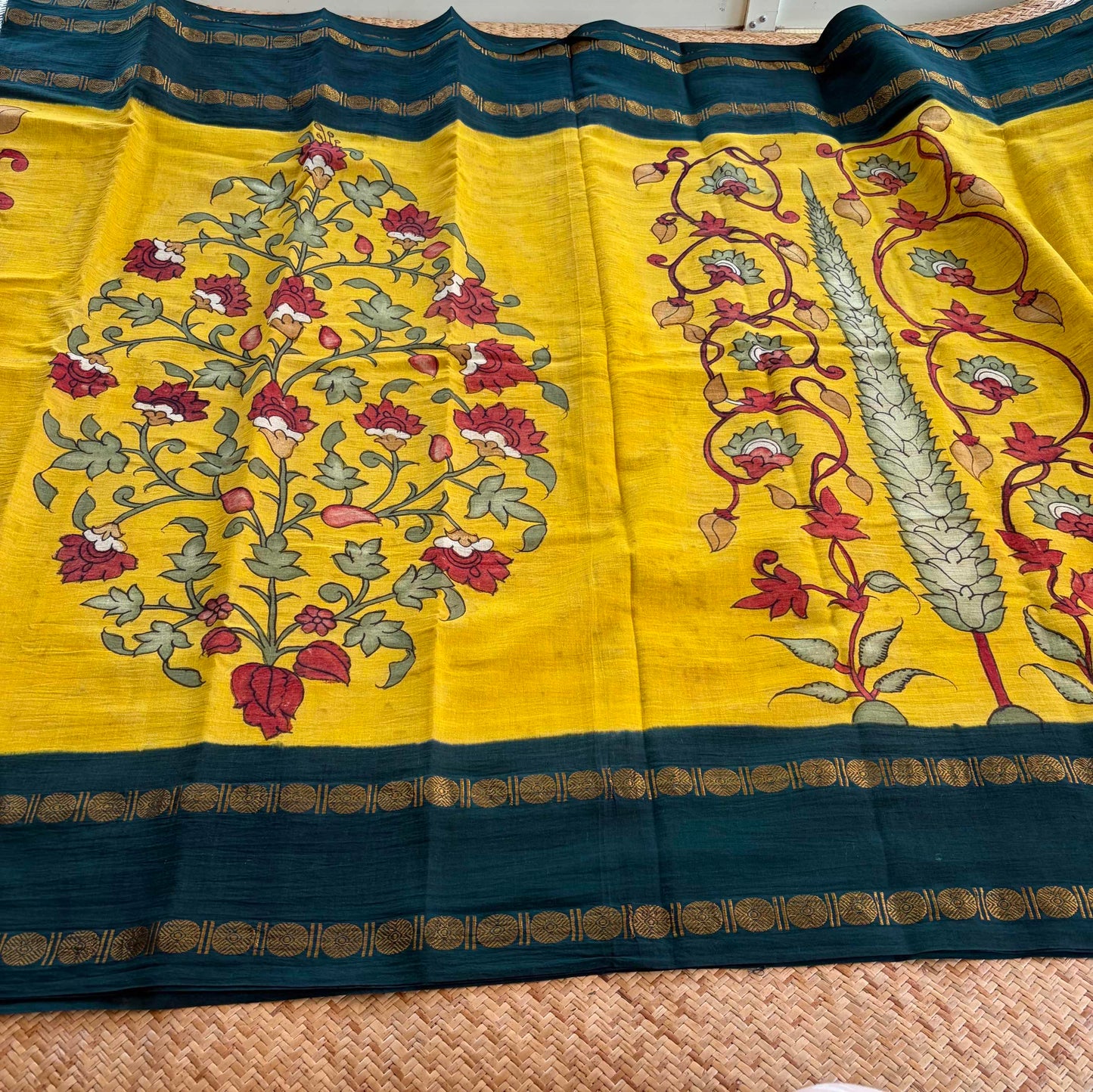 Botanical, Kalamkari Hand Painted on a Madurai Sungudi Cotton saree.