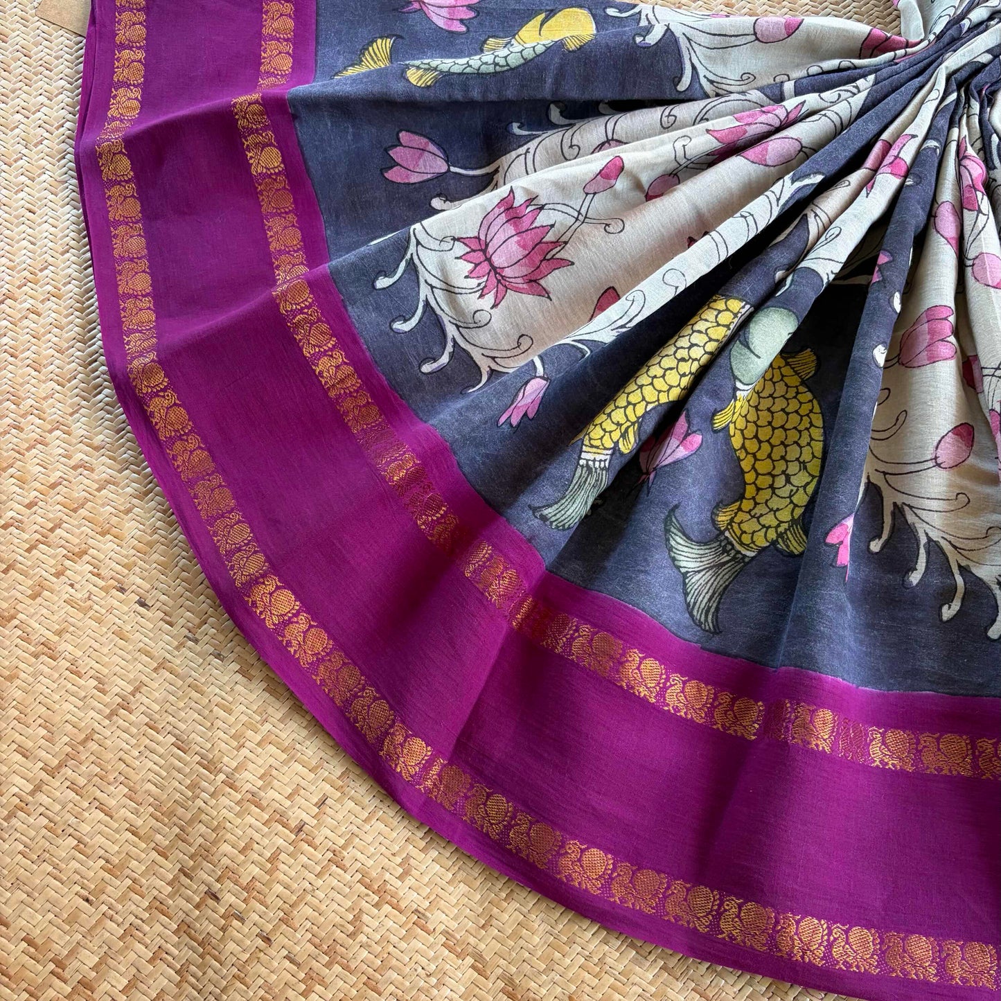 Fish, Kalamkari Hand Painted on a Madurai Sungudi Cotton saree.