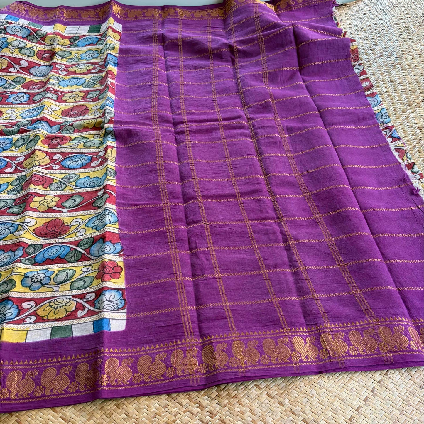Multicoloured Kalamkari Hand Painted on a Madurai Velthari Sungudi Cotton saree.