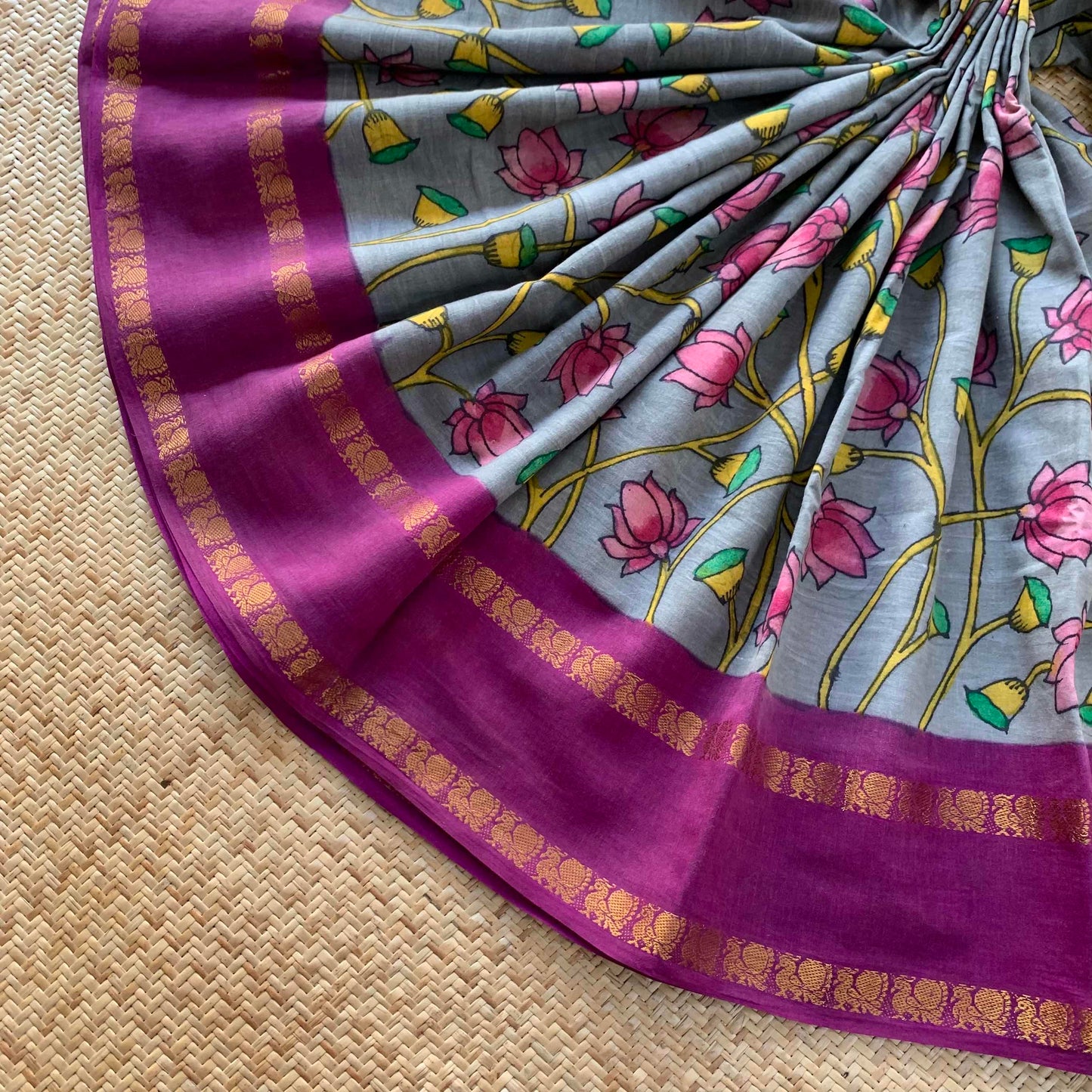 Grey Kalamkari Hand Painted on a Madurai Sungudi Cotton saree.