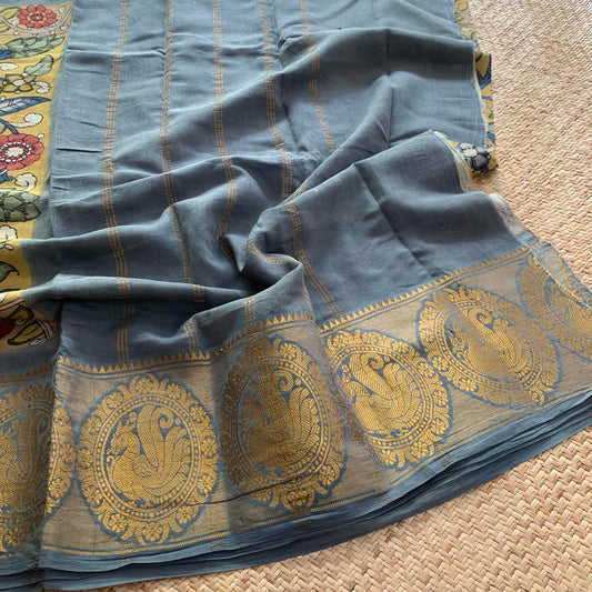 Grey Kalamkari Hand Painted on a Madurai Sungudi Cotton saree.