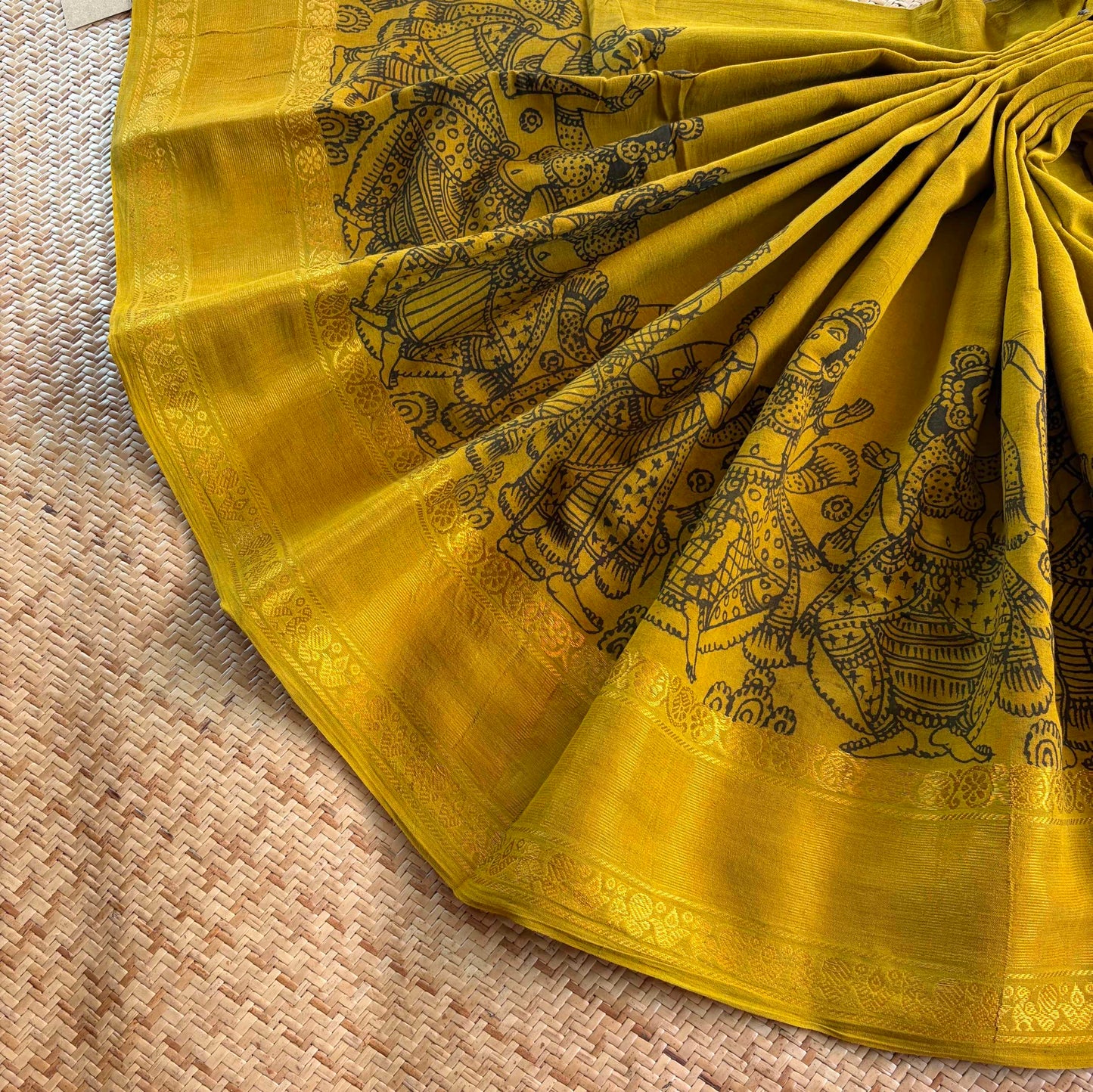 Mustard, Kalamkari Hand Painted on a Madurai Sungudi Cotton saree.