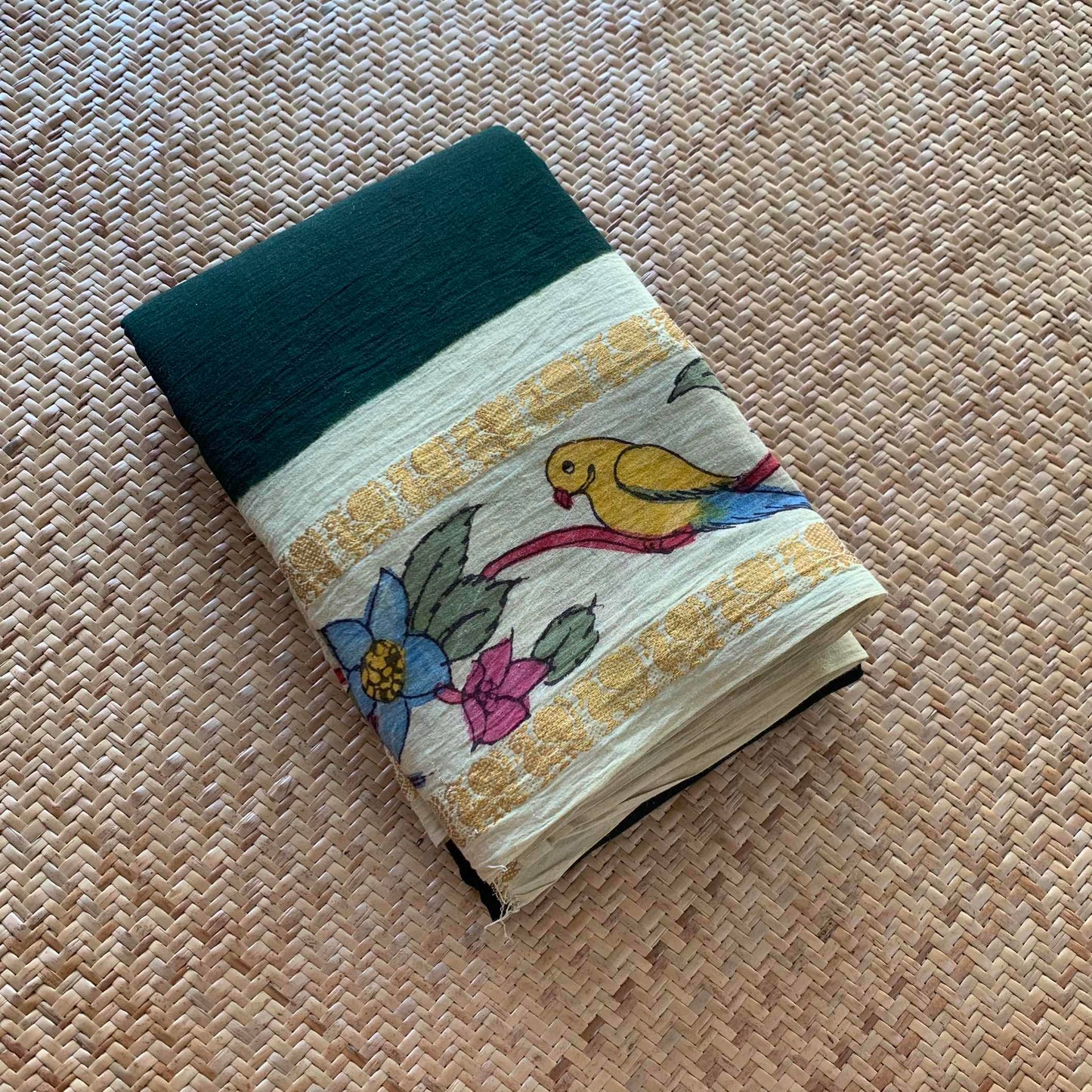 Parrot 🦜 - Kalamkari Hand Painted on a Madurai Sungudi Cotton saree.