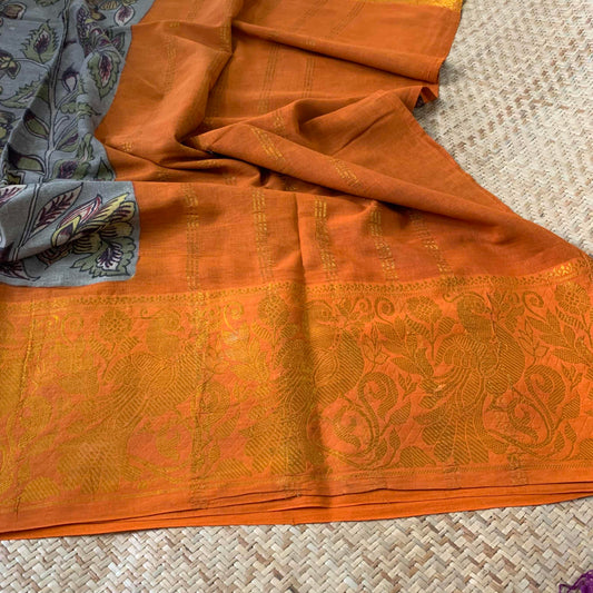 Grey Kalamkari Hand Painted on a Madurai Sungudi Cotton saree.