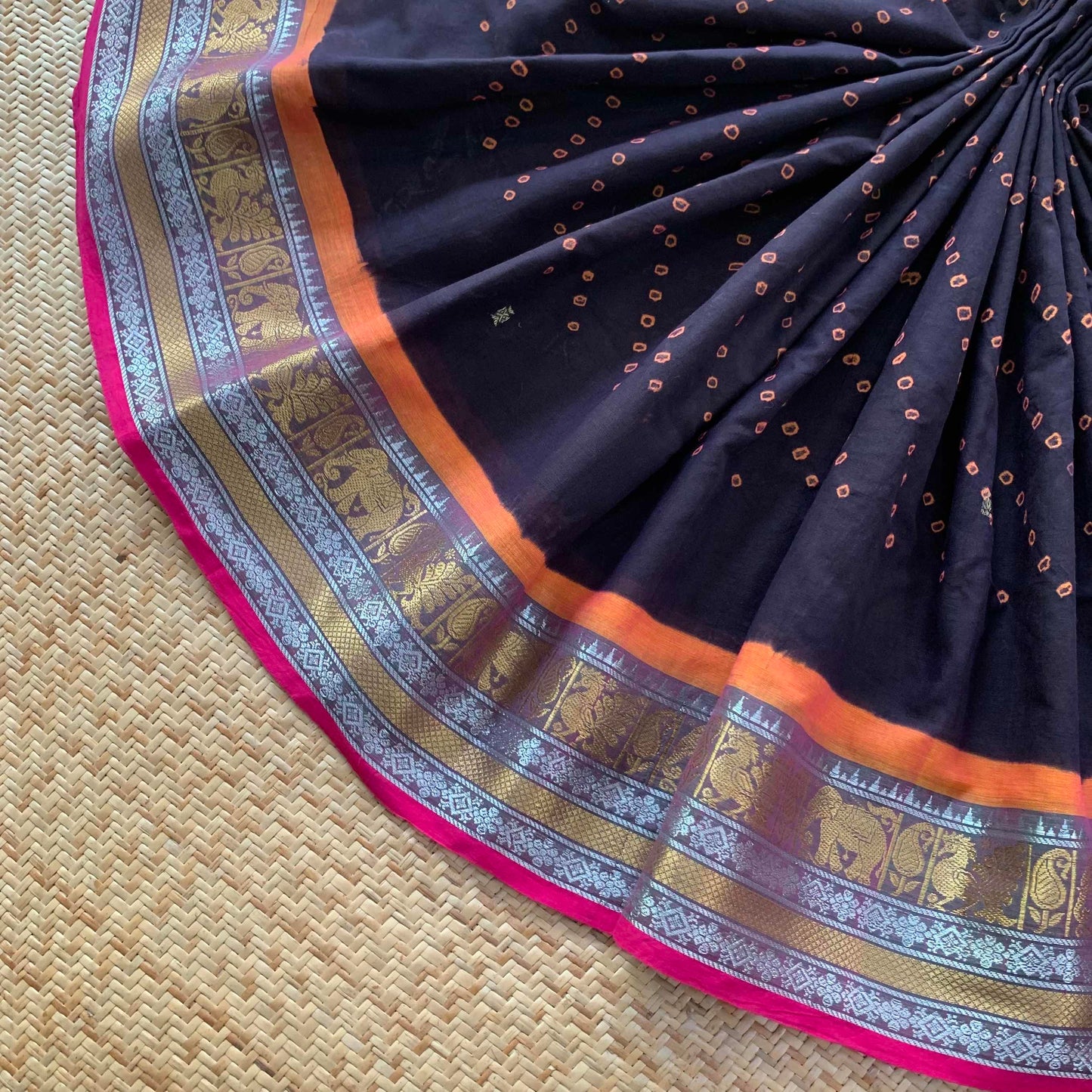 Handknotted Sungudi on Chettinad Cotton Saree, Black saree with Orange Knots And Pallu With Zari Border