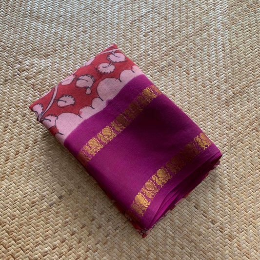 Floral Kalamkari Hand Painted on a Madurai Sungudi Cotton saree.