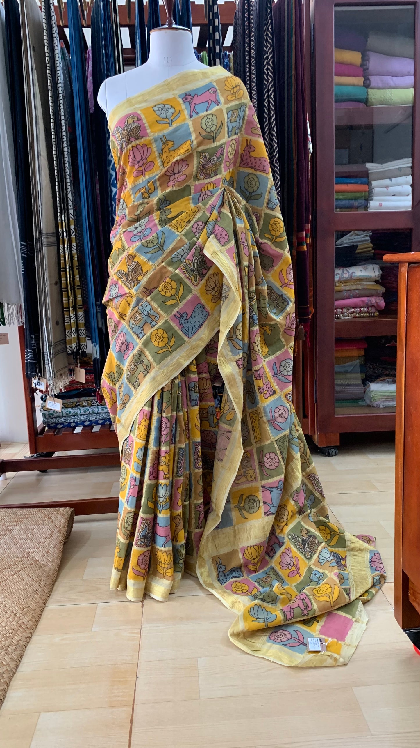 Flora and Fauna, Kalamkari Hand Painted on a Madurai Handwoven Sungudi Cotton saree.