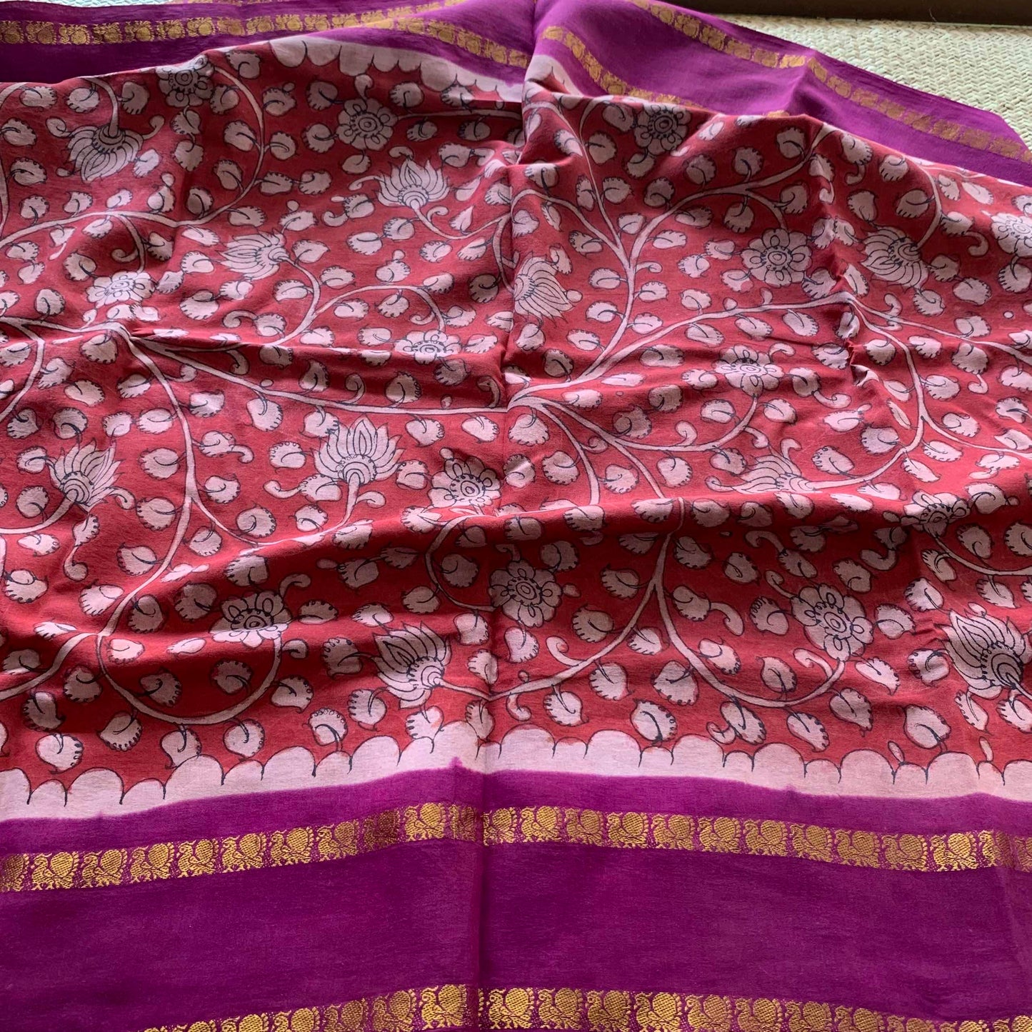 Floral Kalamkari Hand Painted on a Madurai Sungudi Cotton saree.