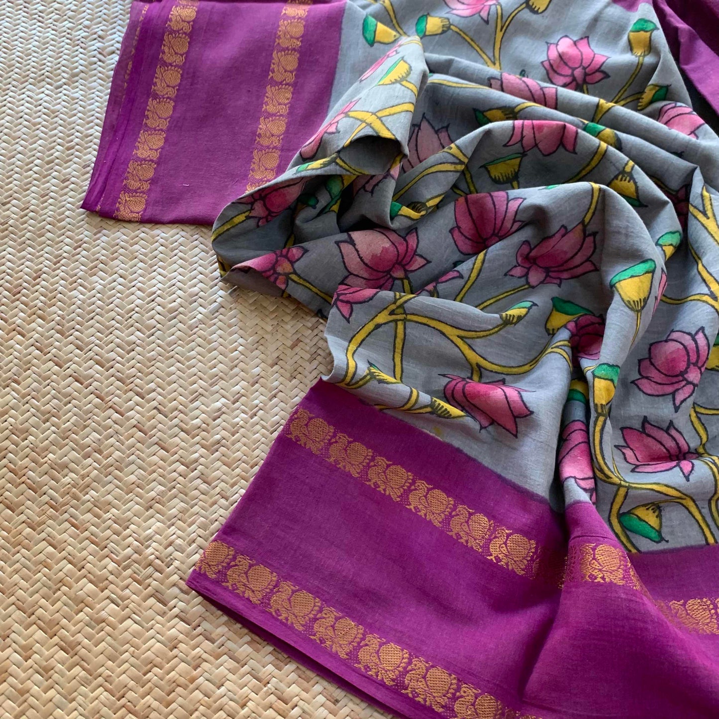 Grey Kalamkari Hand Painted on a Madurai Sungudi Cotton saree.