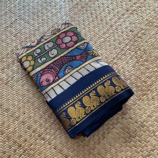 Cream Kalamkari Hand Painted on a Madurai Velthari Sungudi Cotton saree.