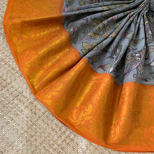 Grey Kalamkari Hand Painted on a Madurai Sungudi Cotton saree.