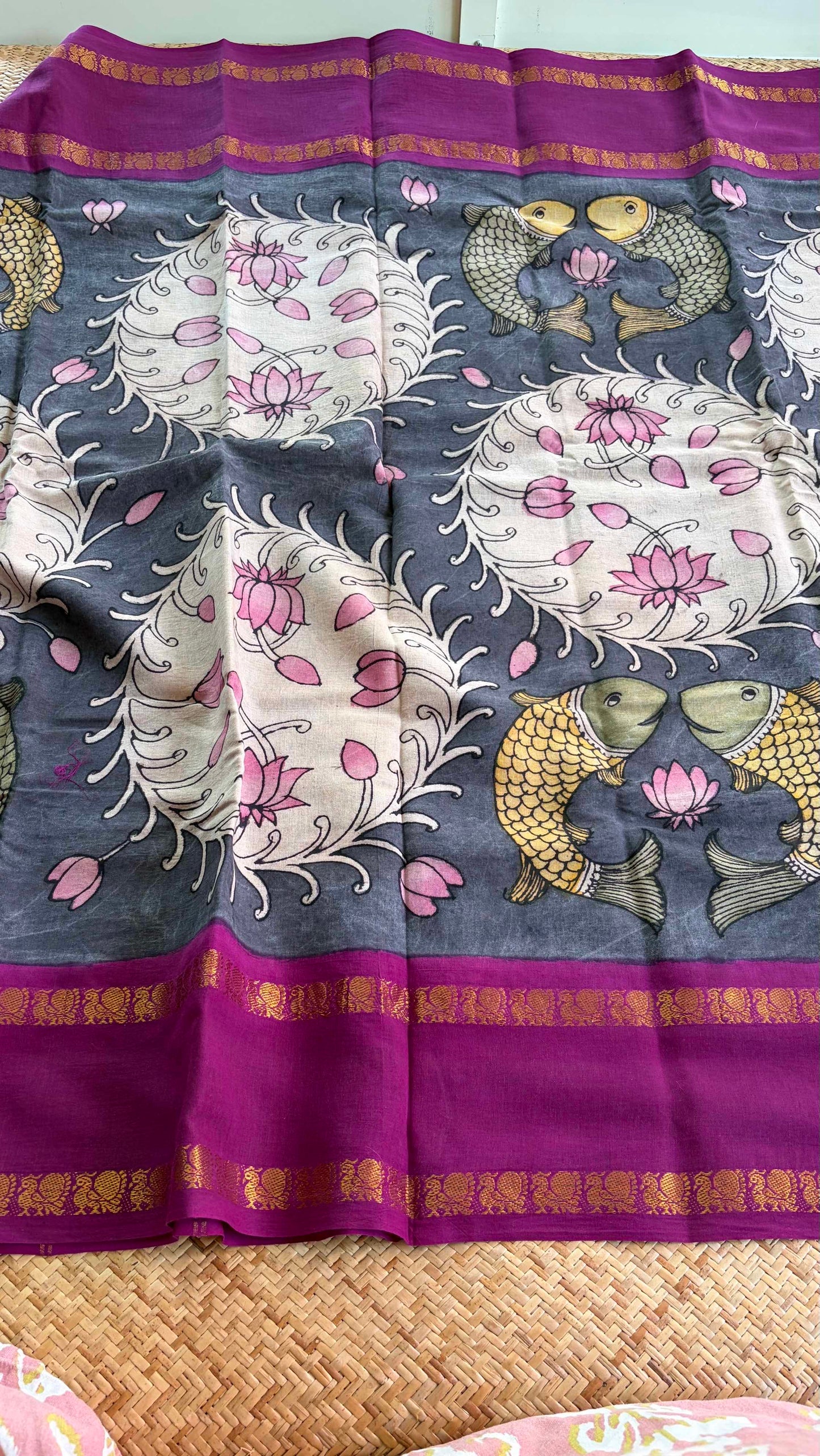 Fish, Kalamkari Hand Painted on a Madurai Sungudi Cotton saree.