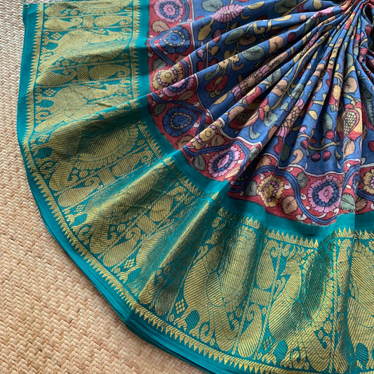 Blue Kalamkari Hand Painted on a Madurai Sungudi Cotton saree.