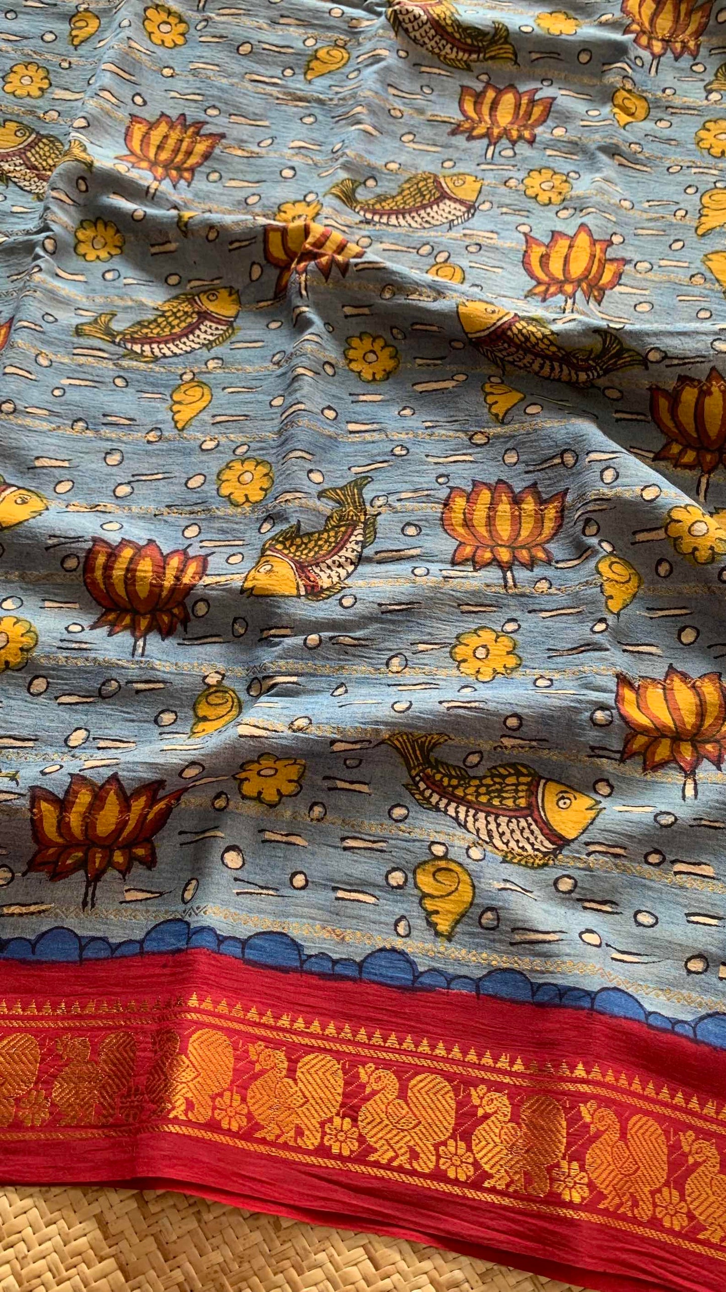Pound- Kalamkari Hand Painted on a Madurai Velthari Sungudi Cotton saree.