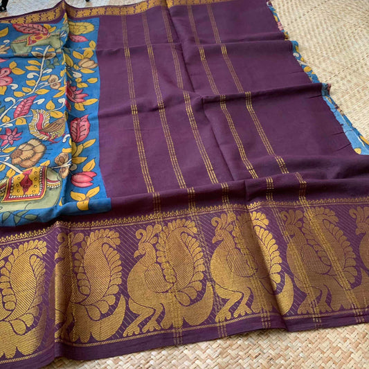 Blue Kalamkari Hand Painted on a Madurai Sungudi Cotton saree.